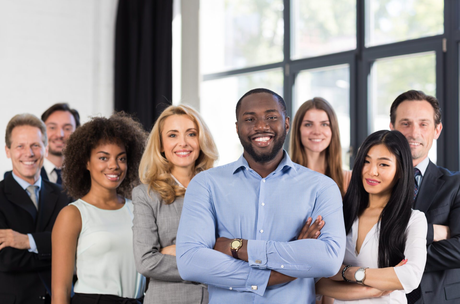 African,American,Businessman,Boss,With,Group,Of,Business,People,In Boyd Homes Employee Benefits