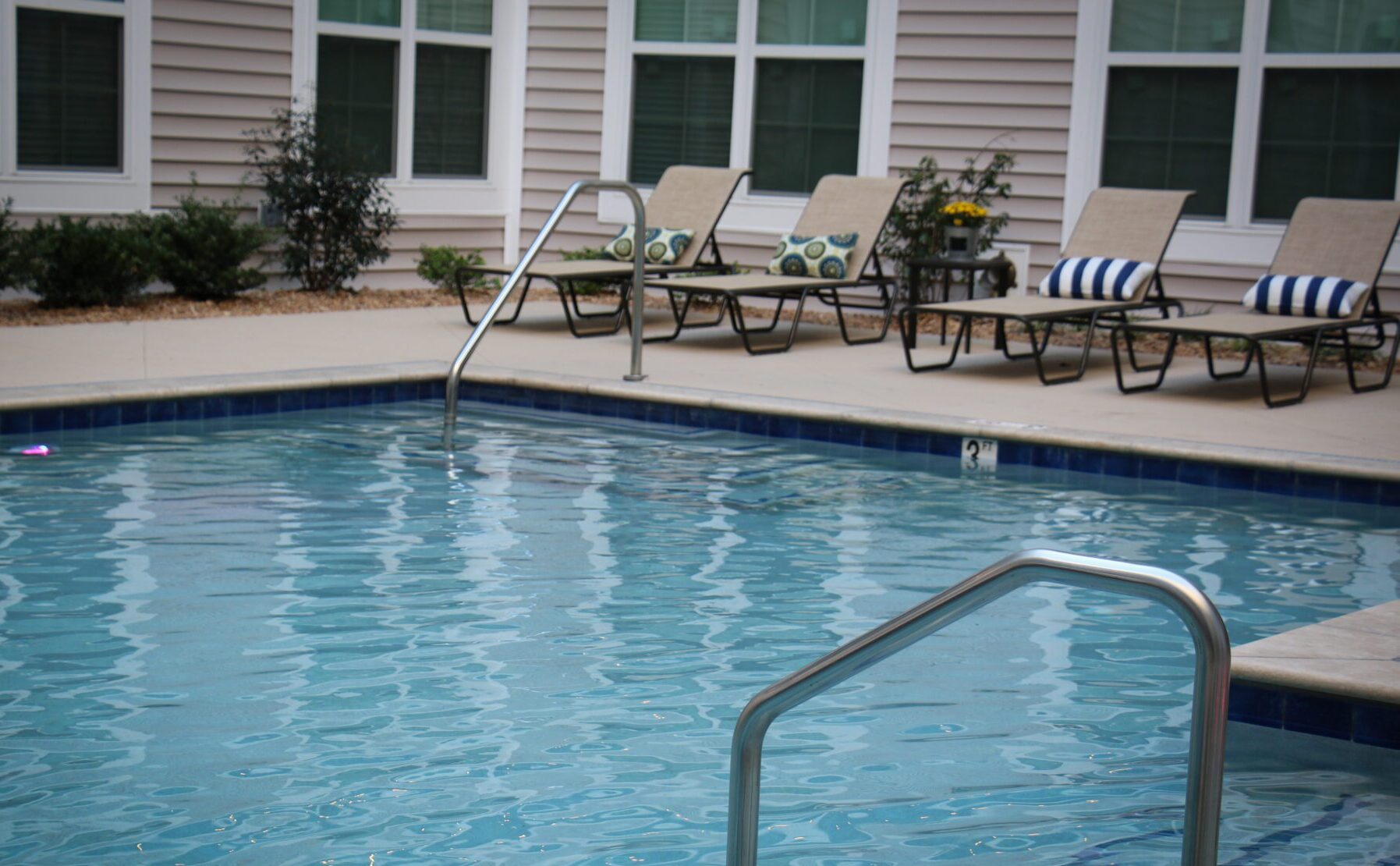 Nexus saltwater pool Nexus Luxury Apartments saltwater pool with water lounge