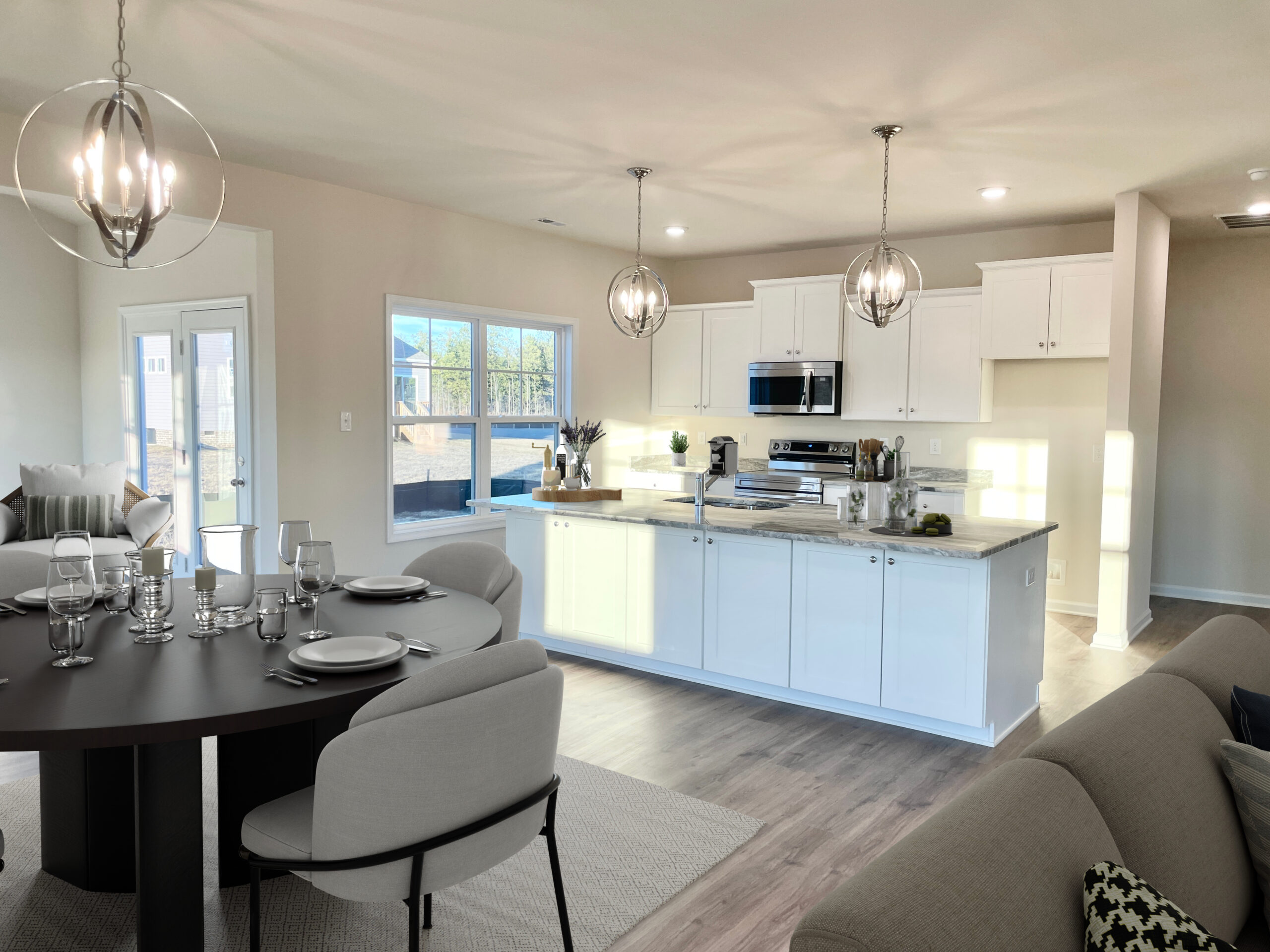Castleton-46-6-juniper-kitchen1-dining Photo of the furnished dining room and kitchen inside the Juniper Lot 46 Section 6 Castleton in Henrico VA