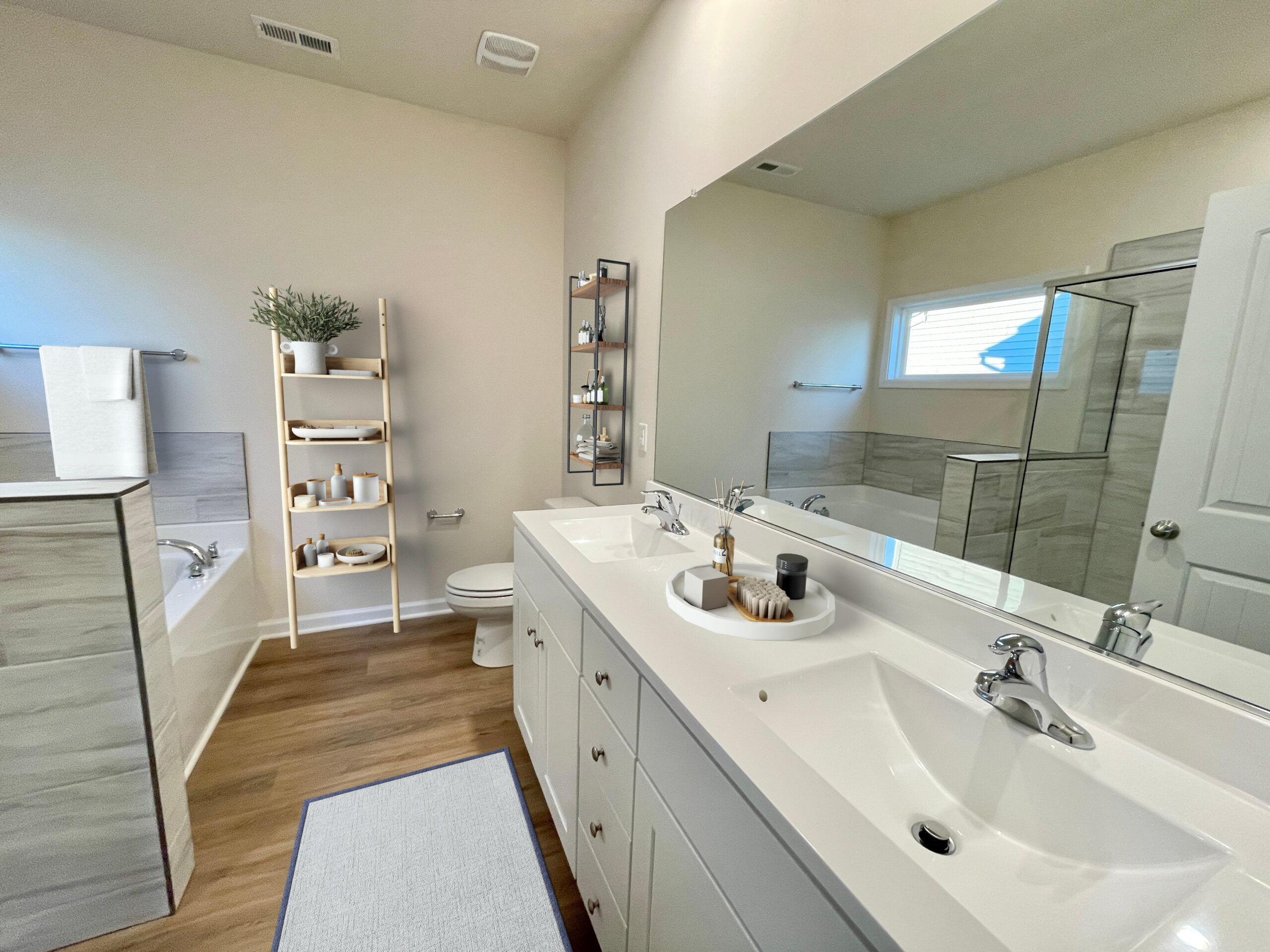 Castleton-46-6-juniper-ownersuite-bath1 Photo of the furnished primary bathroom suite inside the Juniper Lot 46 Section 6 Castleton in Henrico VA